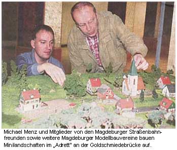 Textfeld:  Michael Menz und Mitglieder von den Magdeburger Straßenbahn-freunden sowie weitere Magdeburger Modellbauvereine bauen Minilandschaften im „Adrett“ an der Goldschmiedebrücke auf.